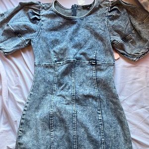 Women dress size L Tight fitting. Jean material. Brand new with tags.